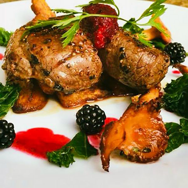 Stourhead Venison with a Port and Garden Blackberry Reduction on Sweet Potato Chips with Kale & Ceps